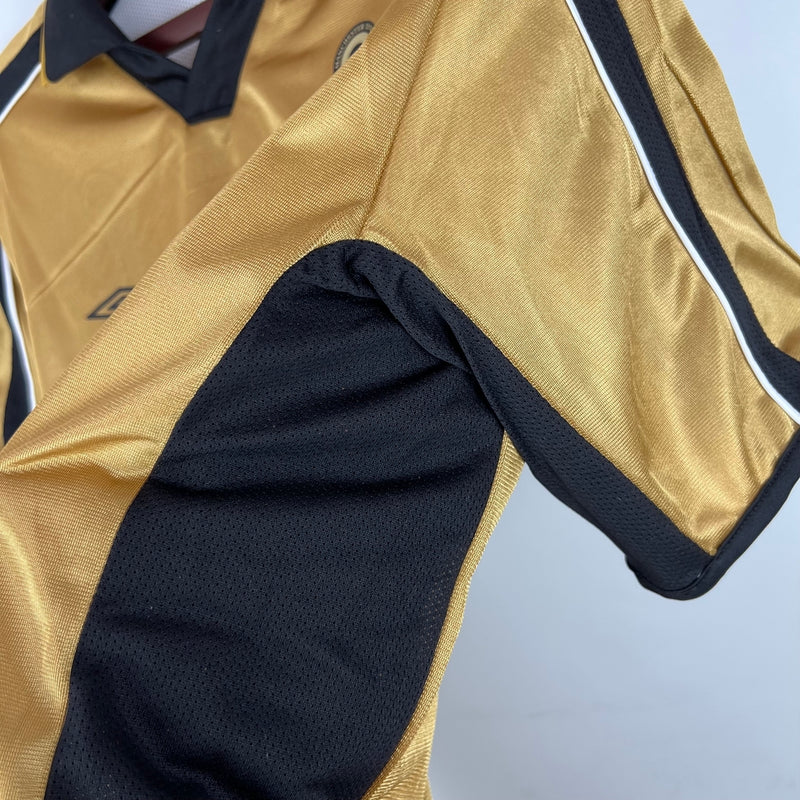 Camisa Retrô Manchester United Edição 100 Anos Masculina- Umbro Braca e preta, Dourada e Preta Dupla Face