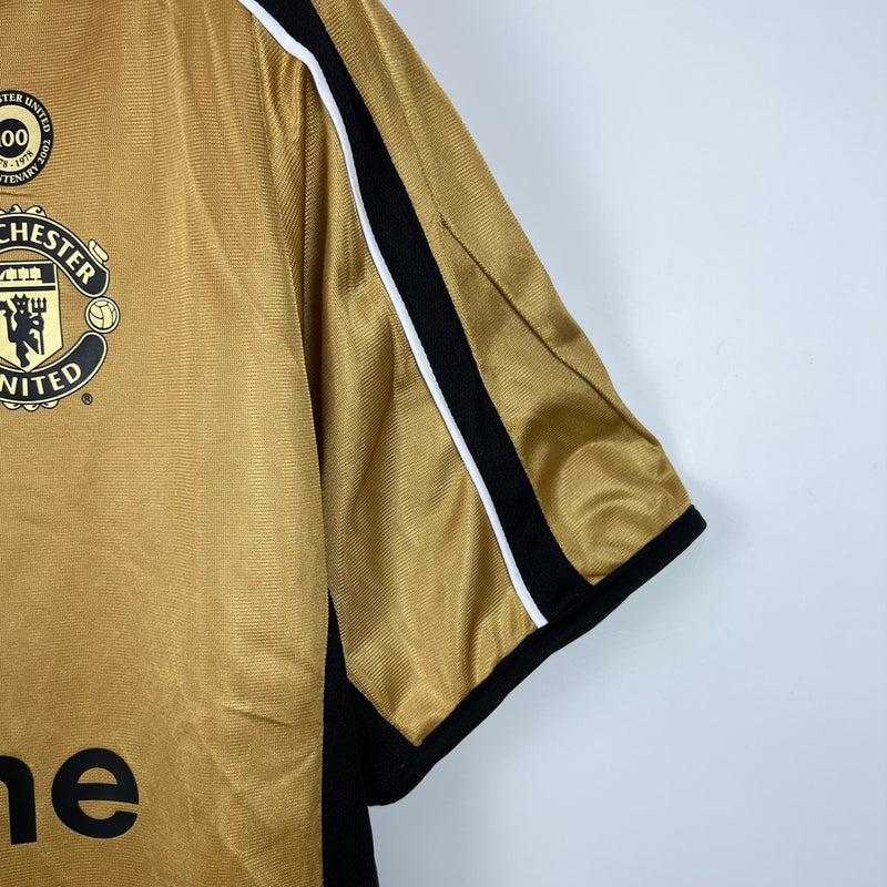 Camisa Retrô Manchester United Edição 100 Anos Masculina- Umbro Braca e preta, Dourada e Preta Dupla Face